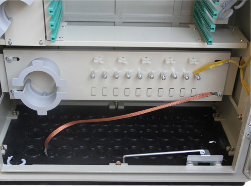 Inside view of wall mounted cable cross connection cabinet